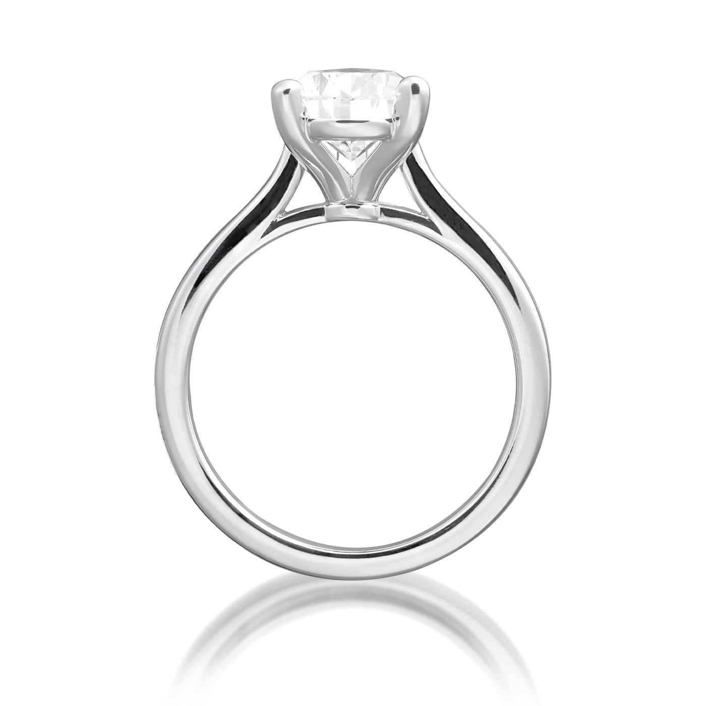 The Raffi&Co.® 14K White Gold Pear Solitaire Diamond Engagement Ring showcases a breathtaking pear-shaped diamond set in a timeless setting, beautifully crafted from 14K white gold, and elegantly displayed against a white background.