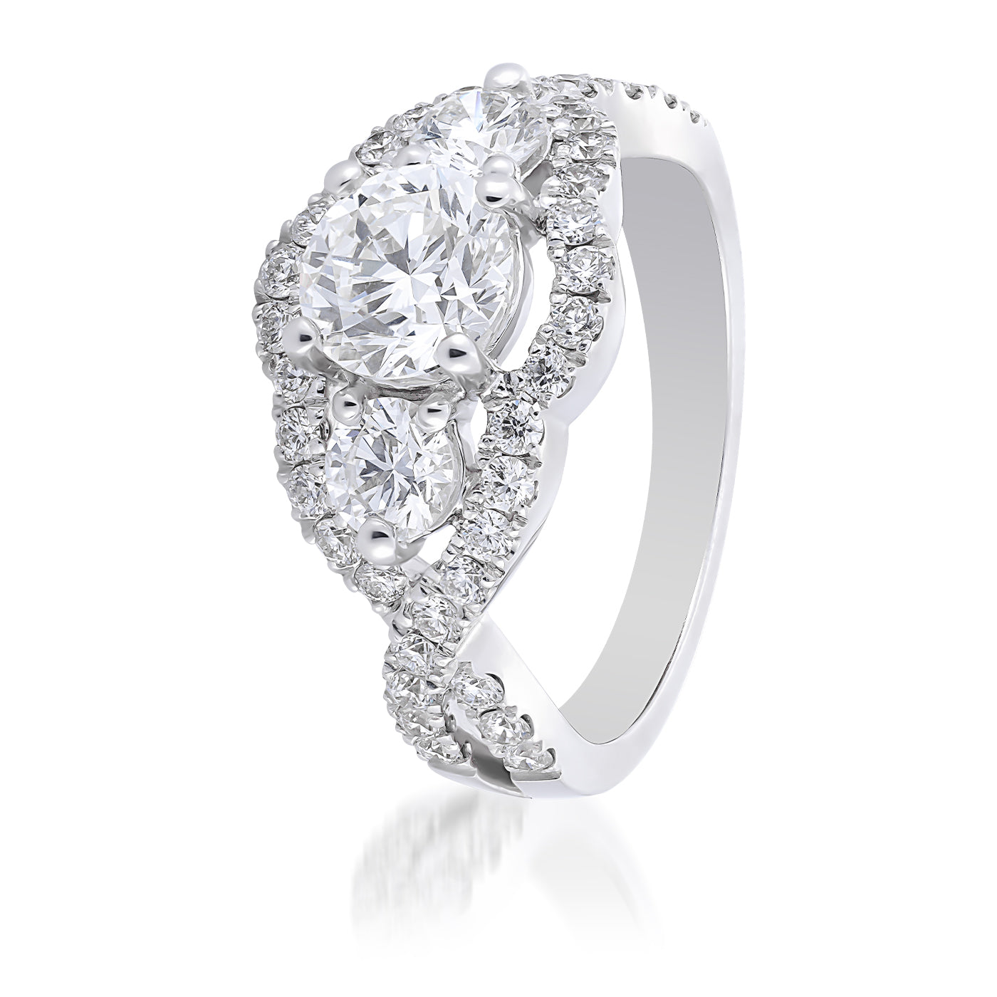 This exquisite Raffi&Co.® 14K White Gold Round Brilliant Three Stone Halo Diamond Engagement Ring features a dazzling central round brilliant diamond accompanied by two smaller oval diamonds. The band, crafted from 14K white gold, is elegantly enhanced with additional smaller diamonds arranged in a graceful swirling pattern.