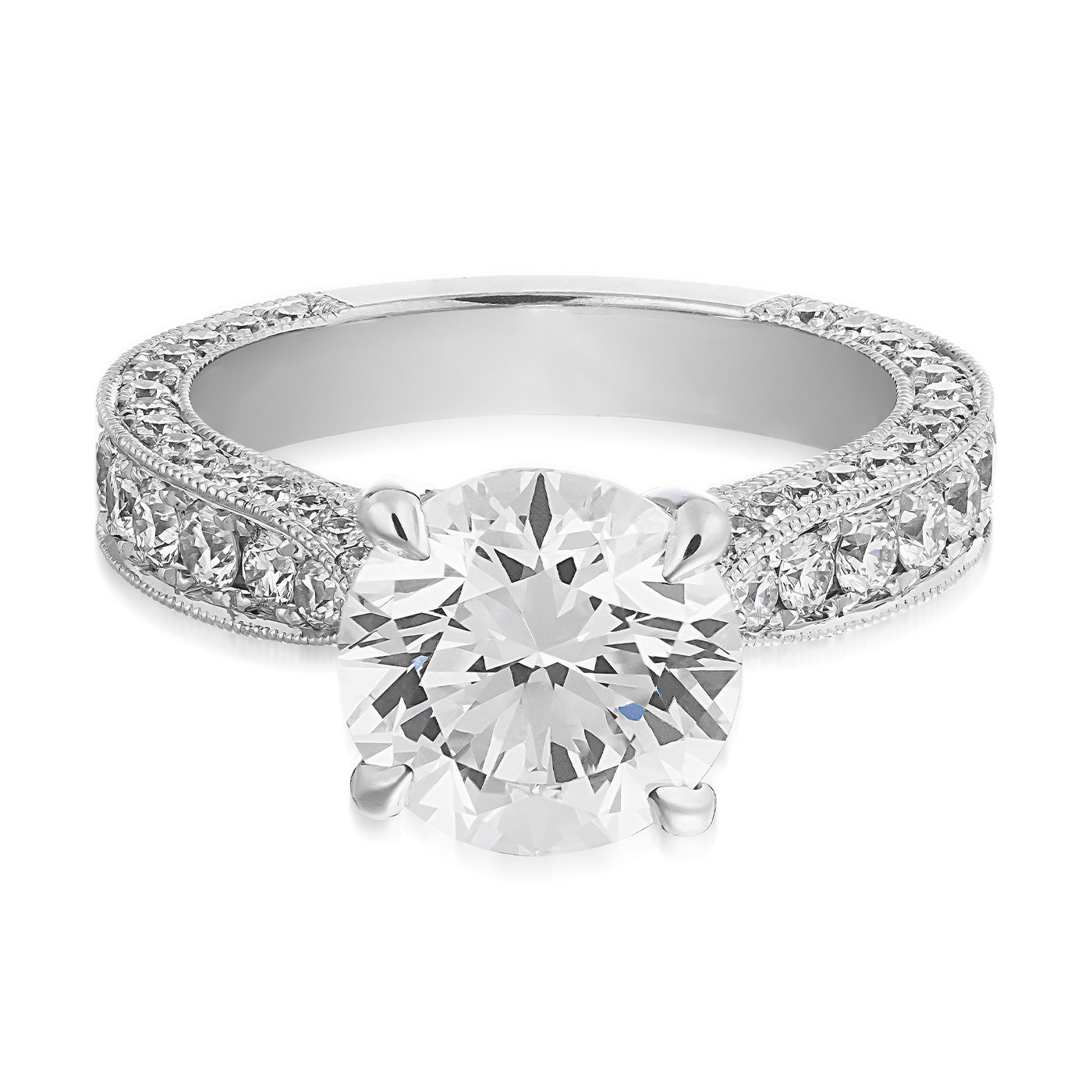 The Raffi&Co.® 18K White Gold Round Brilliant Solitaire Diamond Engagement Ring features a breathtaking 3.05-carat round brilliant center diamond, complemented by smaller diamonds meticulously arranged along the band for an exquisite and luxurious sparkle.