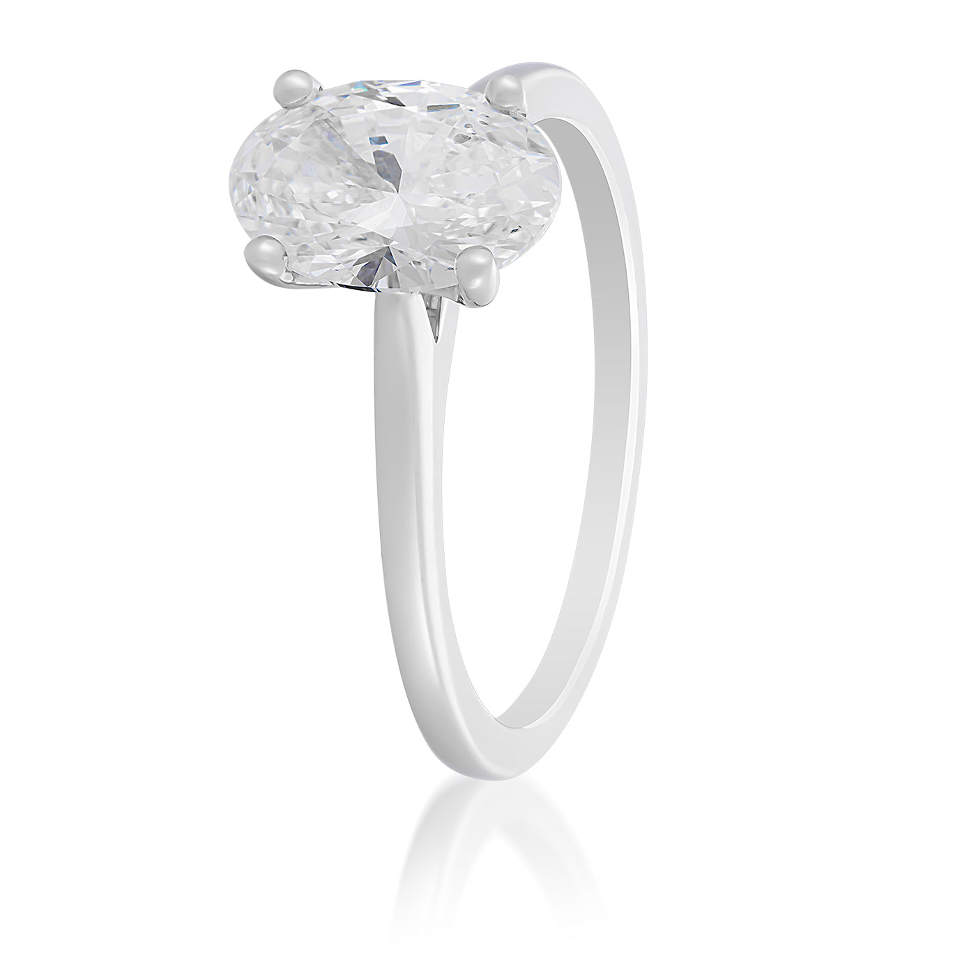 The Raffi&Co.® 14K White Gold Oval Solitaire Engagement Ring by Raffi&Co features a stunning lab diamond set in a four-prong design, elegantly displayed on a white background.