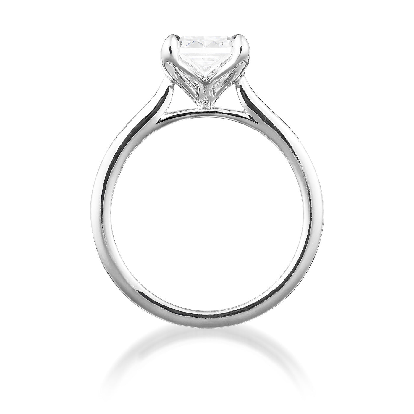 A side view of the Raffi&Co.® 14K White Gold Radiant Solitaire Lab Diamond Engagement Ring showcases its 2.50 carat lab diamond, a transparent square-cut gemstone in a prong setting. The smooth and reflective band of 14K white gold highlights the elegant design of this Raffi&Co ring.