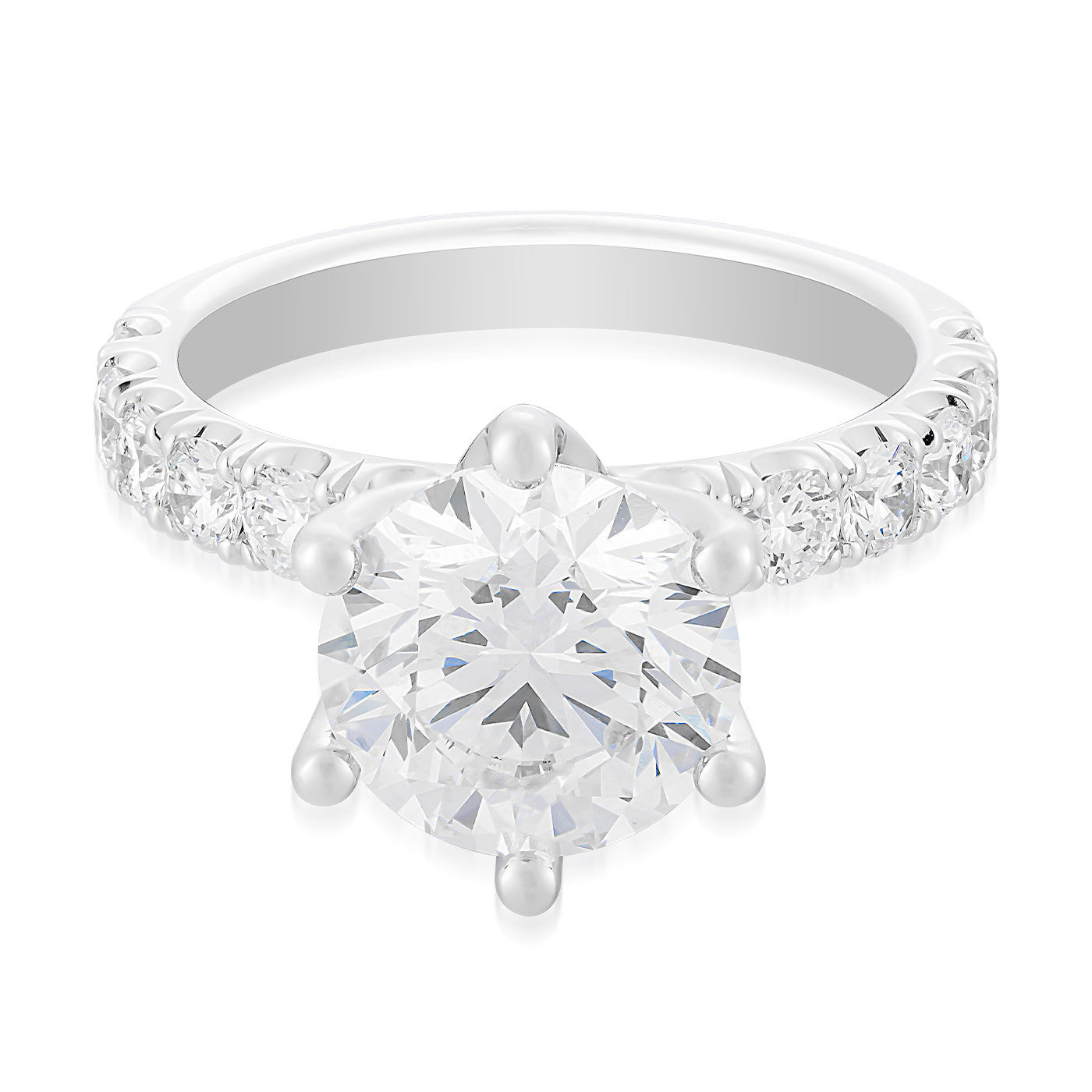 The Raffi&Co.® 14K White Gold Round Brilliant Solitaire Lab Diamond Engagement Ring features a prominent round lab diamond in a six-prong setting, enhanced by smaller diamonds along the band for added sparkle and elegance, showcasing a classic and sophisticated design that highlights the central gemstone.