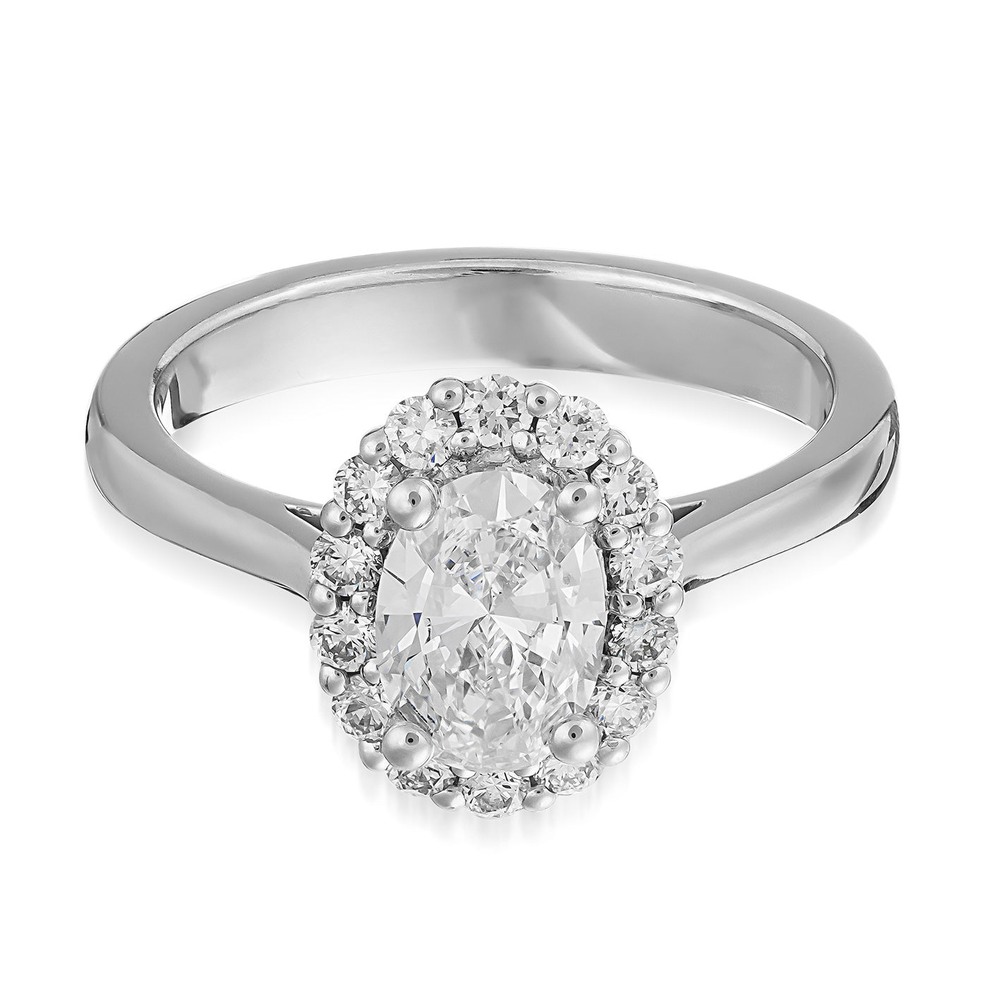 The Raffi&Co.® 14K White Gold Oval Halo Lab Diamond Engagement Ring showcases a center oval-cut diamond surrounded by a dazzling halo of smaller round diamonds, all beautifully set on a polished 14K white gold band.