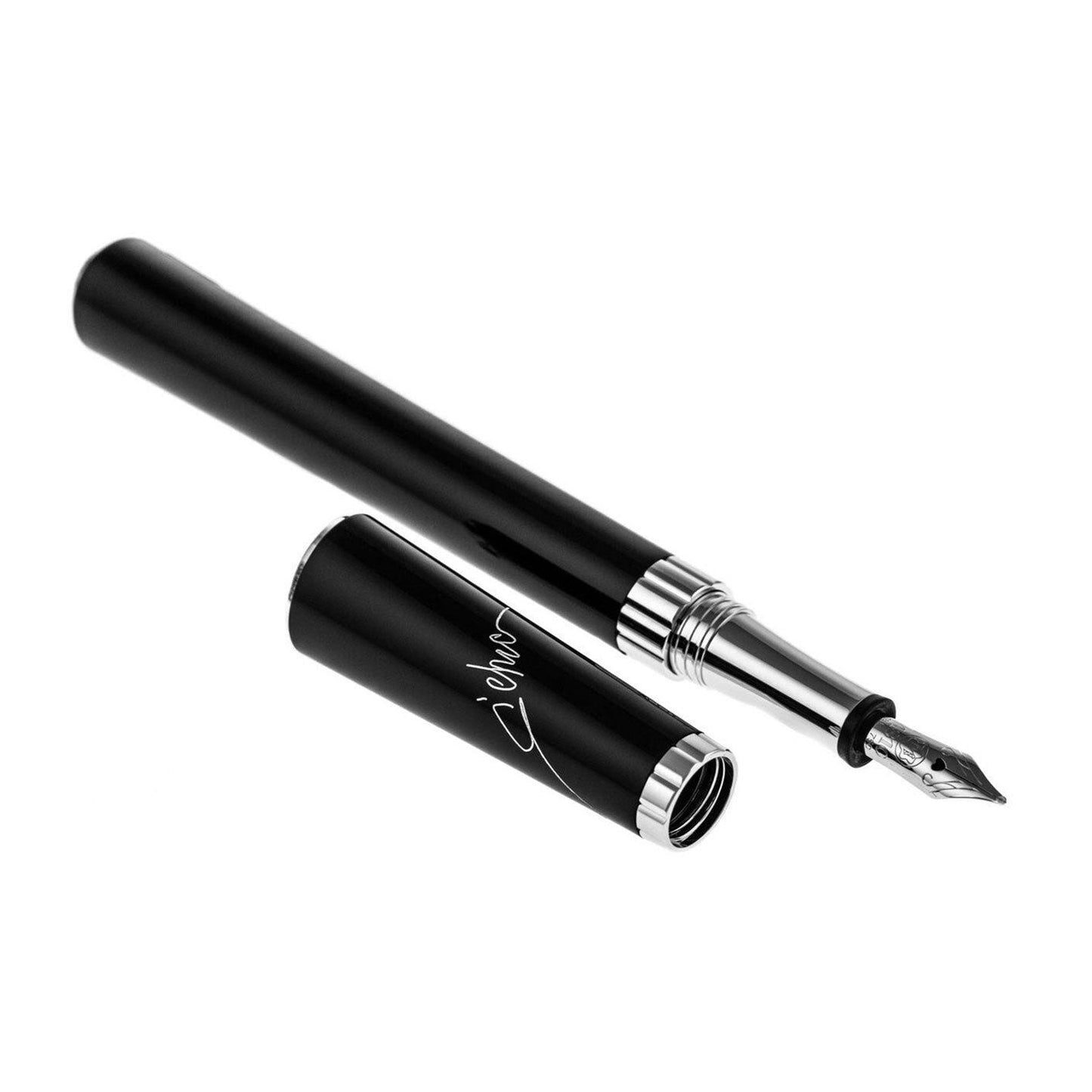 Against a white background rests the elegant Montblanc Muses Marlene Dietrich Fountain Pen, featuring a sleek black body with a platinum-plated clip and silver nib. Beside it lies the cap, adorned with decorative writing that exudes the timeless style of Marlene Dietrich.