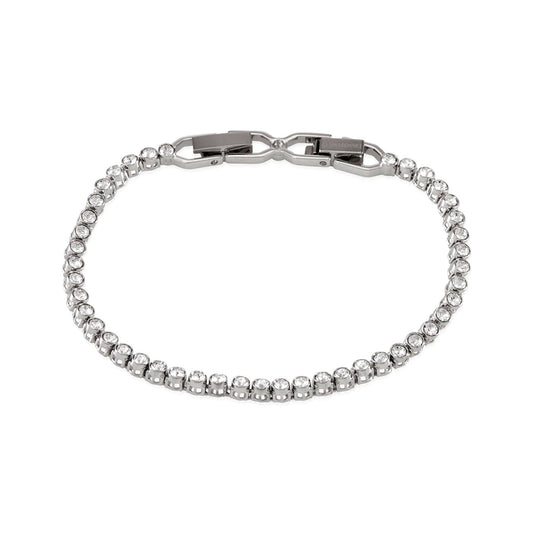 Discover the Swarovski Tennis Bracelet, a stunning piece from the renowned brand Swarovski. This bracelet dazzles with round-cut crystals and boasts a secure clasp and sophisticated design. Enhanced by rhodium plating, it offers a sleek and elegant finish against its white base.