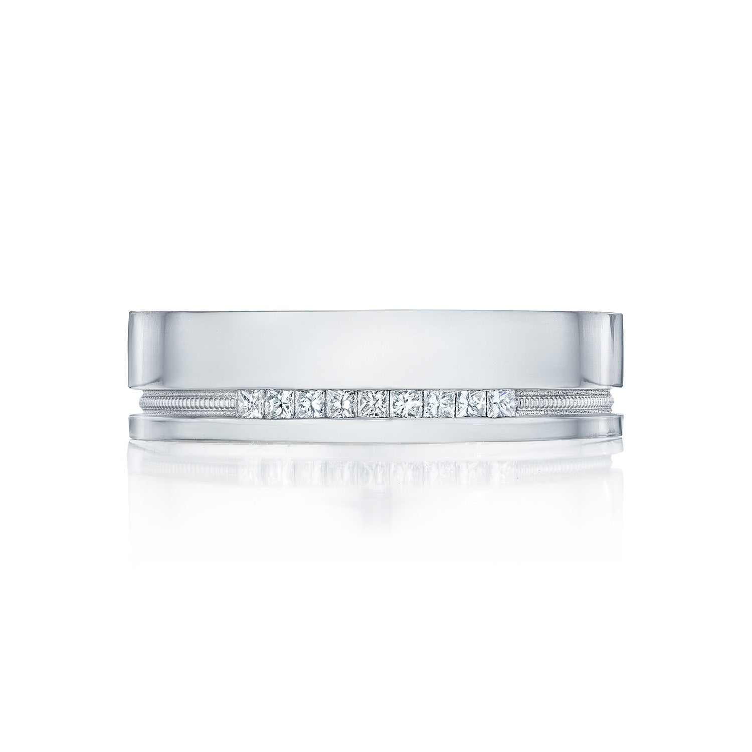 A sophisticated Tacori High Polish Finish men's wedding band, crafted from 18K white gold and adorned with a row of round brilliant diamonds set along its center. This Tacori piece features a shiny, polished surface and a subtle bevel along the edges, exuding timeless elegance.