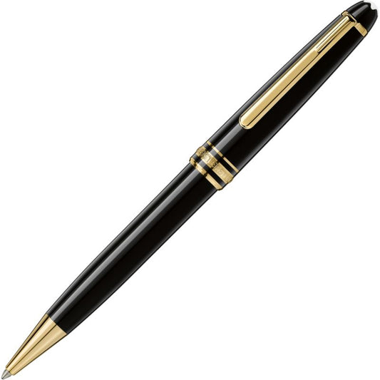 The Montblanc Meisterstuck Classique Ballpoint Pen is a design icon with an elegant diagonal presentation on a white background. It features a sleek construction from deep black precious resin and is adorned with gold accents, including a clip and decorative rings near the top.