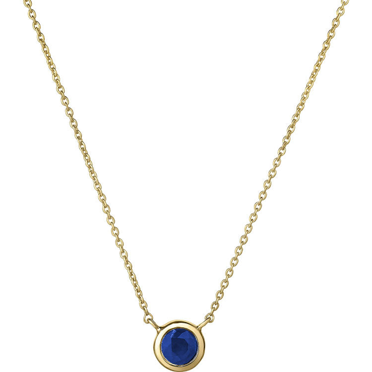 The Roberto Coin Tiny Treasure 18K Yellow Gold Sapphire Bezel Necklace Pendant showcases a round blue sapphire (0.30 CT) set in a simple bezel of 18 karat yellow gold, displayed against a white background.
