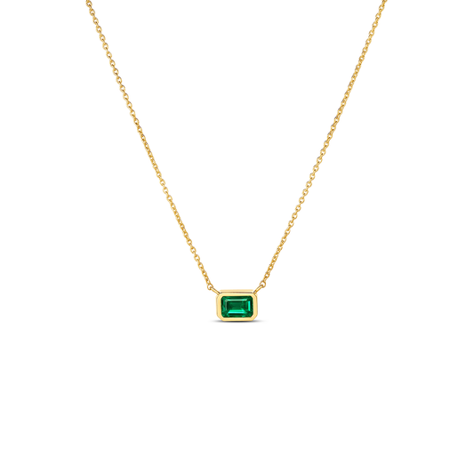 Roberto Coin Tiny Treasures 18K Yellow Gold Emerald Necklace Pendant featuring a rectangular emerald in a bezel setting on an 18K yellow gold chain.