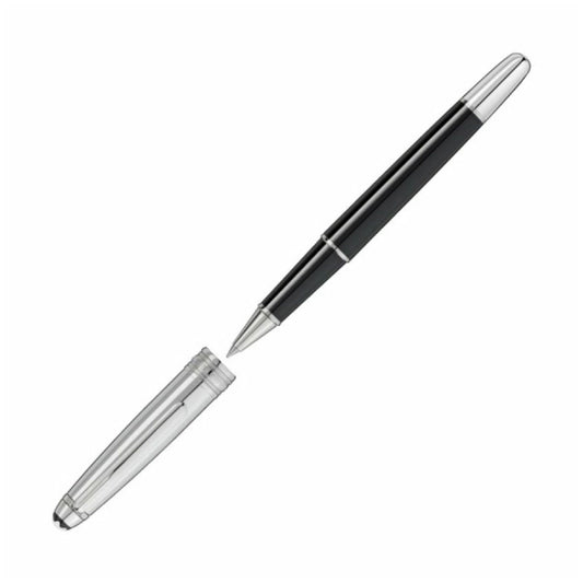 A Montblanc Meisterstück Doue Classique Rollerball Pen in a sleek black and silver design, with its cap removed, lies separately. The pen features a shiny metallic finish at both ends, creating a polished and elegant look against a white background.