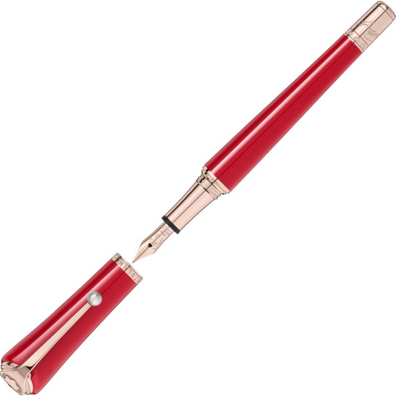A Montblanc Muses Marilyn Monroe Special Edition Fountain Pen, adorned in red with gold accents, sits gracefully, its cap placed neatly beside the nib, evoking timeless elegance.