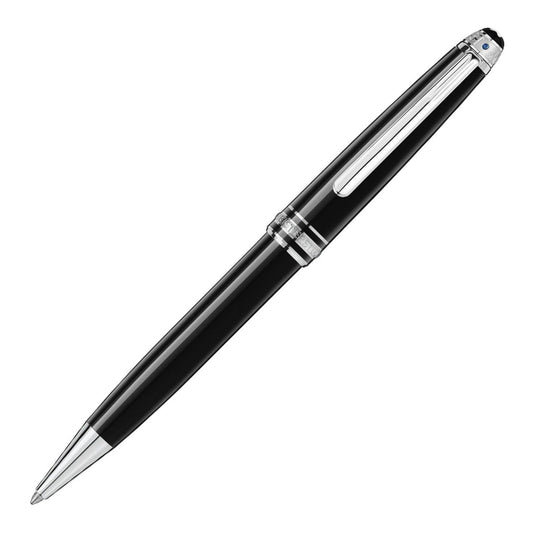 Behold the Montblanc Meisterstück UNICEF Classique Ballpoint Pen, an elegant black writing instrument accented with silver features and a streamlined design. Its shiny clip and polished tip enhance its sophisticated appearance, presented against a stark white background.