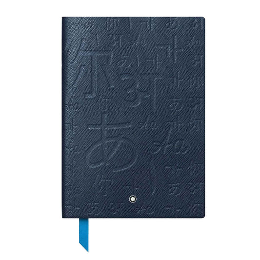 The Montblanc Unicef Note Pad by Montblanc is a dark blue notebook featuring embossed text in multiple languages on its cover. It boasts a textured surface and a vibrant turquoise ribbon bookmark that elegantly extends from the bottom, adding a touch of sophistication.