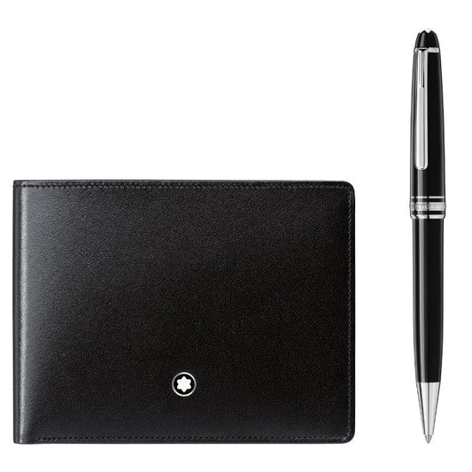 Montblanc's Meisterstück Classique Ballpoint Writing Instrument and Meisterstück Wallet 6CC Gift Set features a black leather wallet adorned with a circular white emblem near the edge, complemented by a sleek pen with platinum-coated details. These exquisite items are elegantly displayed on a plain white background.