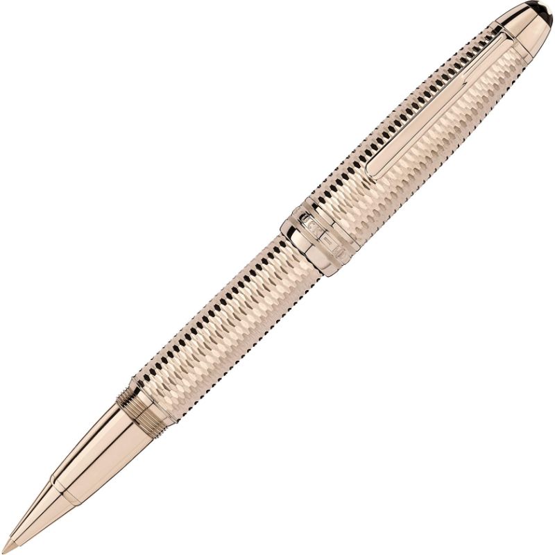 A Montblanc Meisterstuck Geometry Solitaire LeGrand rollerball pen, featuring a textured body and sleek detailing, is angled diagonally against a white background.
