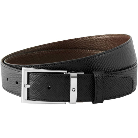 The Montblanc Reversible Leather Belt features a black Saffiano printed leather design with a textured finish, highlighted by a sleek palladium-coated pin buckle. It offers multiple adjustment holes while maintaining its polished aesthetic.