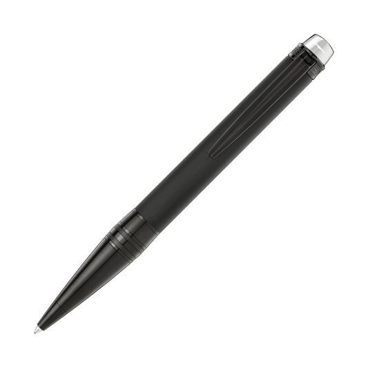 The Montblanc Starwalker Ultra Black Ballpoint Pen, with its sleek black finish and silver accents, rests diagonally on a plain white background. This pen features a smooth barrel and a cap clip, offering elegant styling for professionals.