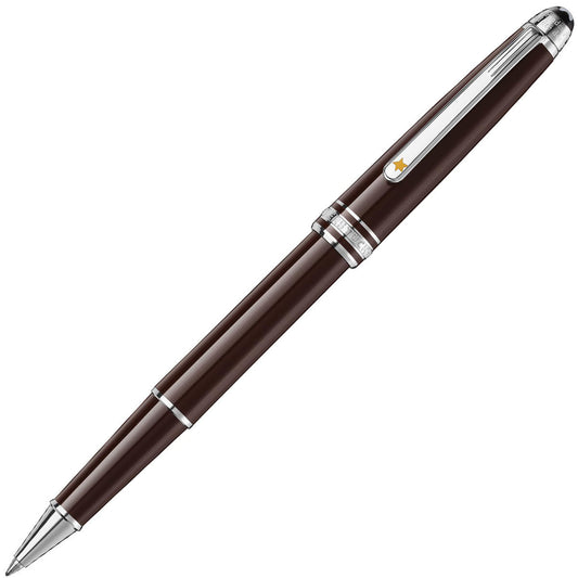 The Montblanc Meisterstück Le Petit Prince Classique Rollerball pen features an elegant Aviator Brown design with silver accents, including a clip adorned with a small star symbol. This sleek Montblanc pen showcases a smooth, glossy finish and an elegant, modern look inspired by the timeless charm of Petit Prince.