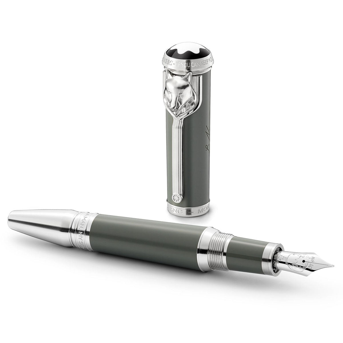 Introducing the Montblanc Writers Edition Homage To Rudyard Kipling Limited Edition Fountain Pen, a luxurious writing instrument with a gray barrel and silver accents. The upright cap proudly displays an intricate silver emblem, while the meticulously crafted silver nib highlights this limited edition's exquisite artistry.