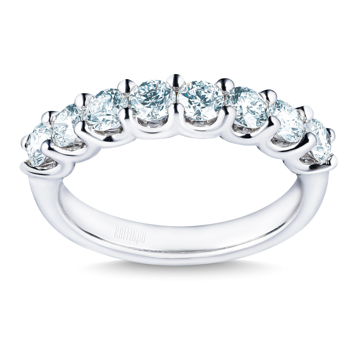 The Raffi&Co.® 14K White Gold Round Brilliant Diamond Anniversary Ring features seven prong-set diamonds along the band, shown on a white background.