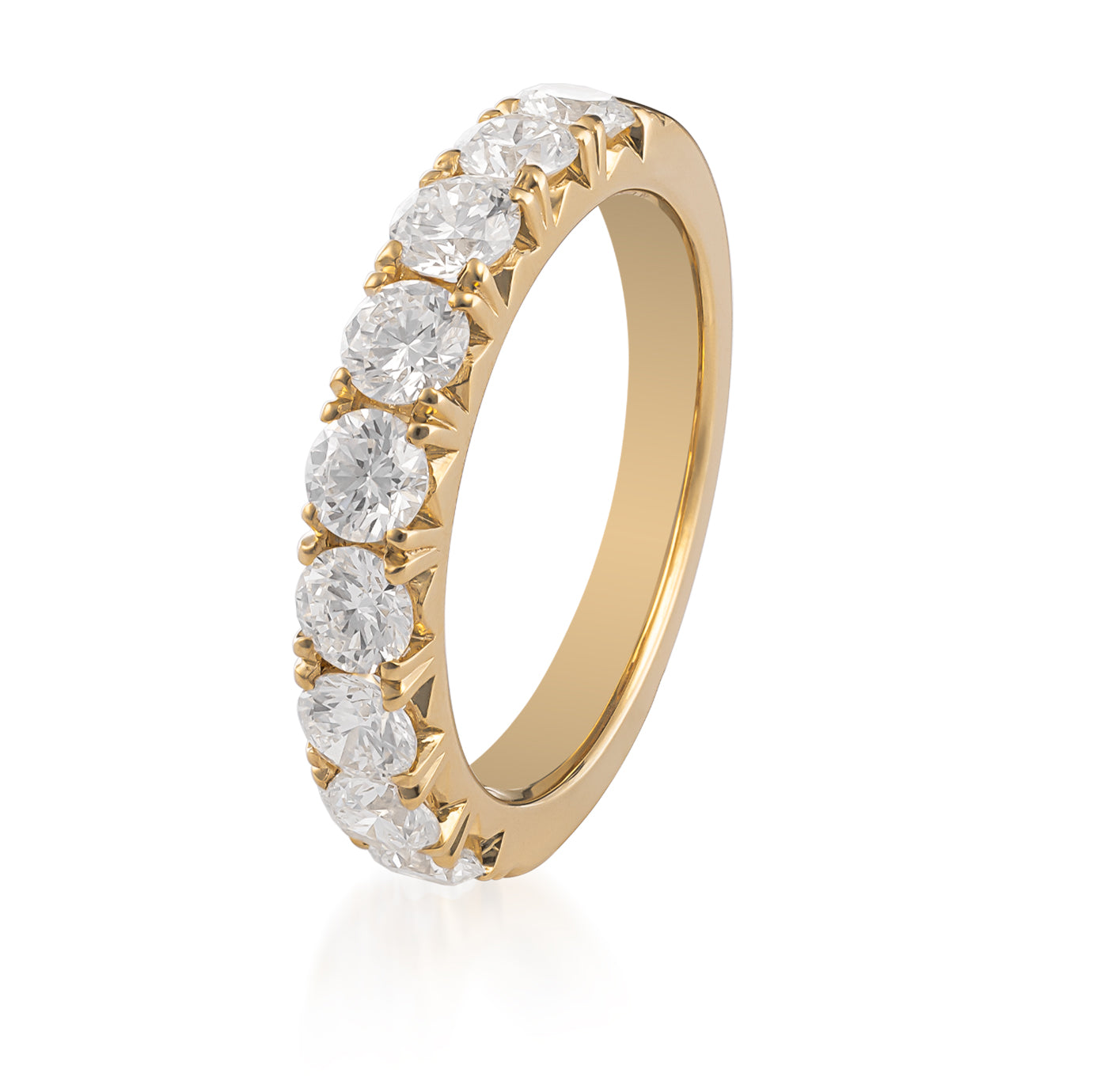 Discover the elegance of the Raffi&Co.® 18K Yellow Gold Round Brilliant Diamond Anniversary Ring. This exquisite piece features seven dazzling round brilliant-cut diamonds, beautifully arranged in a row along the band, symbolizing timeless love and sophistication.