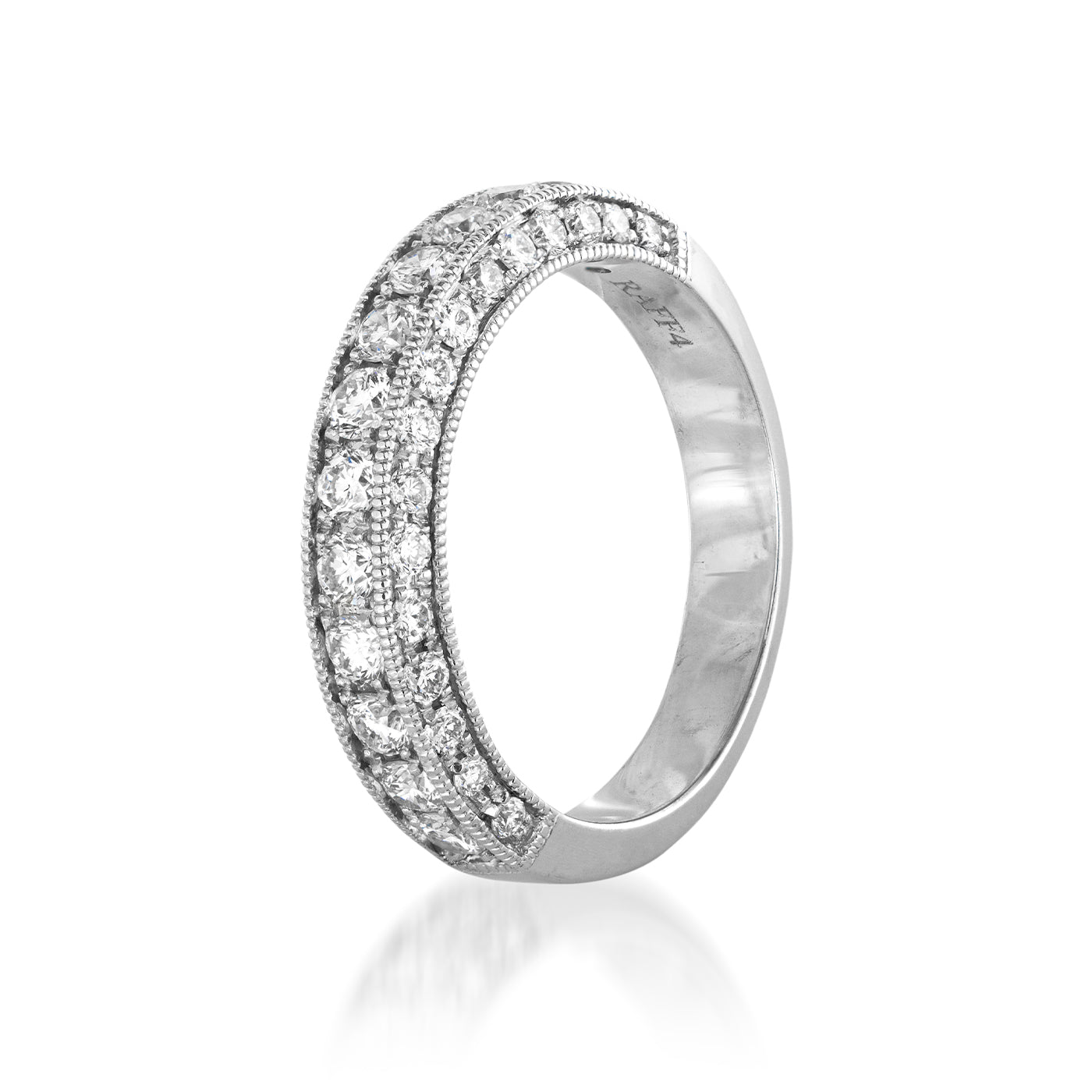 Introducing the Raffi&Co.® 14K White Gold Round Brilliant Diamond Anniversary Ring, an exquisite piece ideal for celebrating special milestones. This ring boasts intricate detailing with small, clear gemstones set in an ornate design. Crafted in lustrous 14K white gold, its radiance is comparable to that of a diamond and is beautifully showcased against a simple white background.