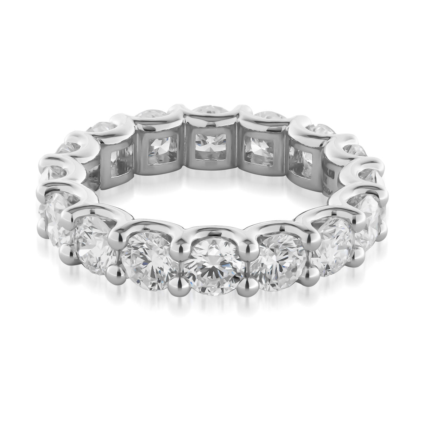 Introducing the Raffi&Co.® 14K White Gold Round Brilliant Diamond Eternity Ring, a dazzling piece that features multiple round lab diamonds set seamlessly in a continuous band. This sparkling and elegant design shines beautifully against a plain white background, making it the perfect choice for celebrating an anniversary.