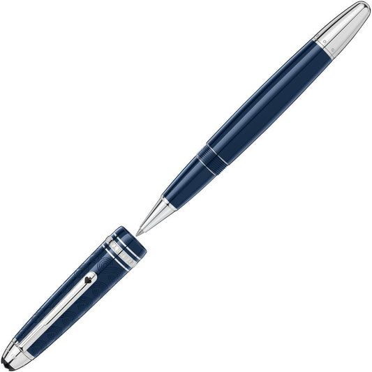 The Montblanc Meisterstück Around the World in 80 Days LeGrand Rollerball Pen, a stylish blue and silver writing instrument inspired by Jules Verne's adventures, is positioned diagonally on a white background. This design features a glossy finish and detailed metal accents, embodying the spirit of exploration.