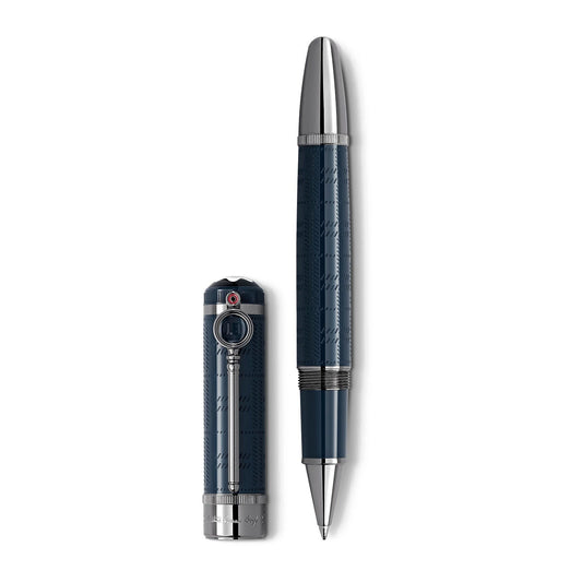 Introducing the Montblanc Writers Edition Sir Arthur Conan Doyle Limited Edition Rollerball Pen, a luxury writing instrument in blue featuring intricate silver detailing on the cap and nib. The exquisite cap is displayed separately, standing upright beside the pen to showcase its elegant design and craftsmanship that evokes the spirit of Sir Arthur Conan Doyle himself.