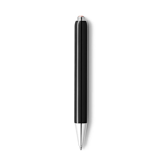 The Montblanc Heritage Rouge et Noir Baby Special Edition Black Ballpoint Pen showcases a sleek design with a glossy finish and silver accents, including a metal tip and clip. It stands vertically against a plain white background, exuding timeless elegance.