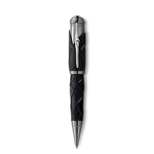 Against a plain white background, the Montblanc Writers Edition Homage to the Brother Grimm Limited Edition Ballpoint Pen is showcased vertically, highlighting its elegant design with sleek black features and intricate silver detailing on the cap and body. This exquisite piece from Montblanc celebrates the timeless fairy tales of Brothers Grimm with precision craftsmanship.
