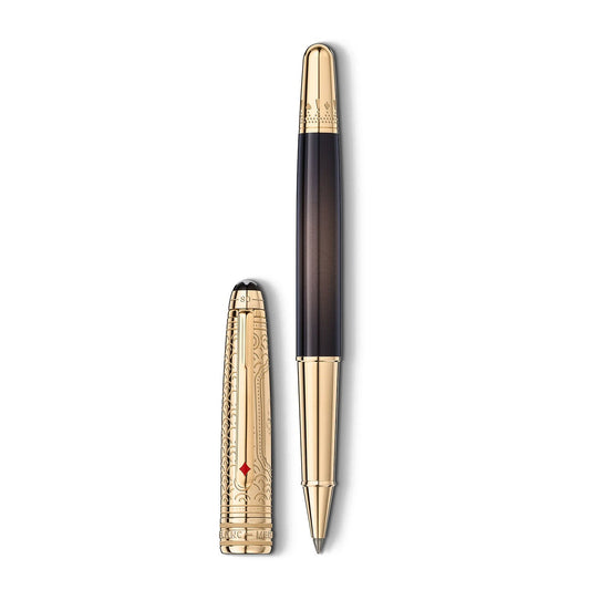 The Montblanc Meisterstück Around the World in 80 Days Doue Classique rollerball pen features intricate gold detailing on the cap and a sleek black gradient barrel. It is displayed with the cap removed, elegantly showcasing its design against a white background, reminiscent of a Jules Verne adventure novel.