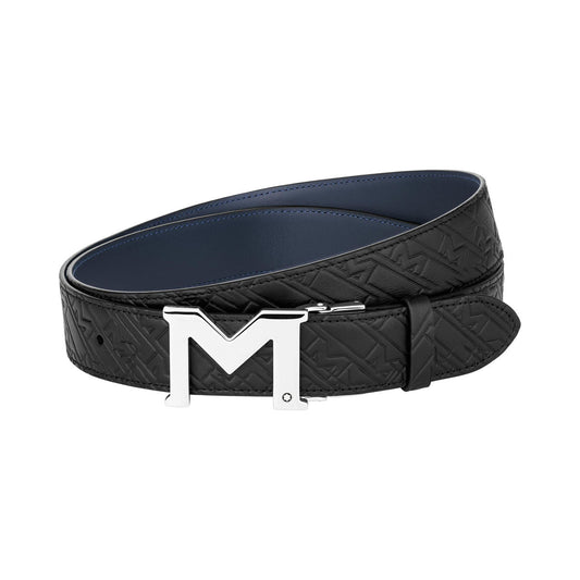 Discover the sophistication of the Montblanc M Buckle Leather Belt, crafted in black leather with embossed patterns and featuring a distinctive silver "M"-shaped buckle. This reversible belt by Montblanc combines versatility and elegance in one stylish accessory.