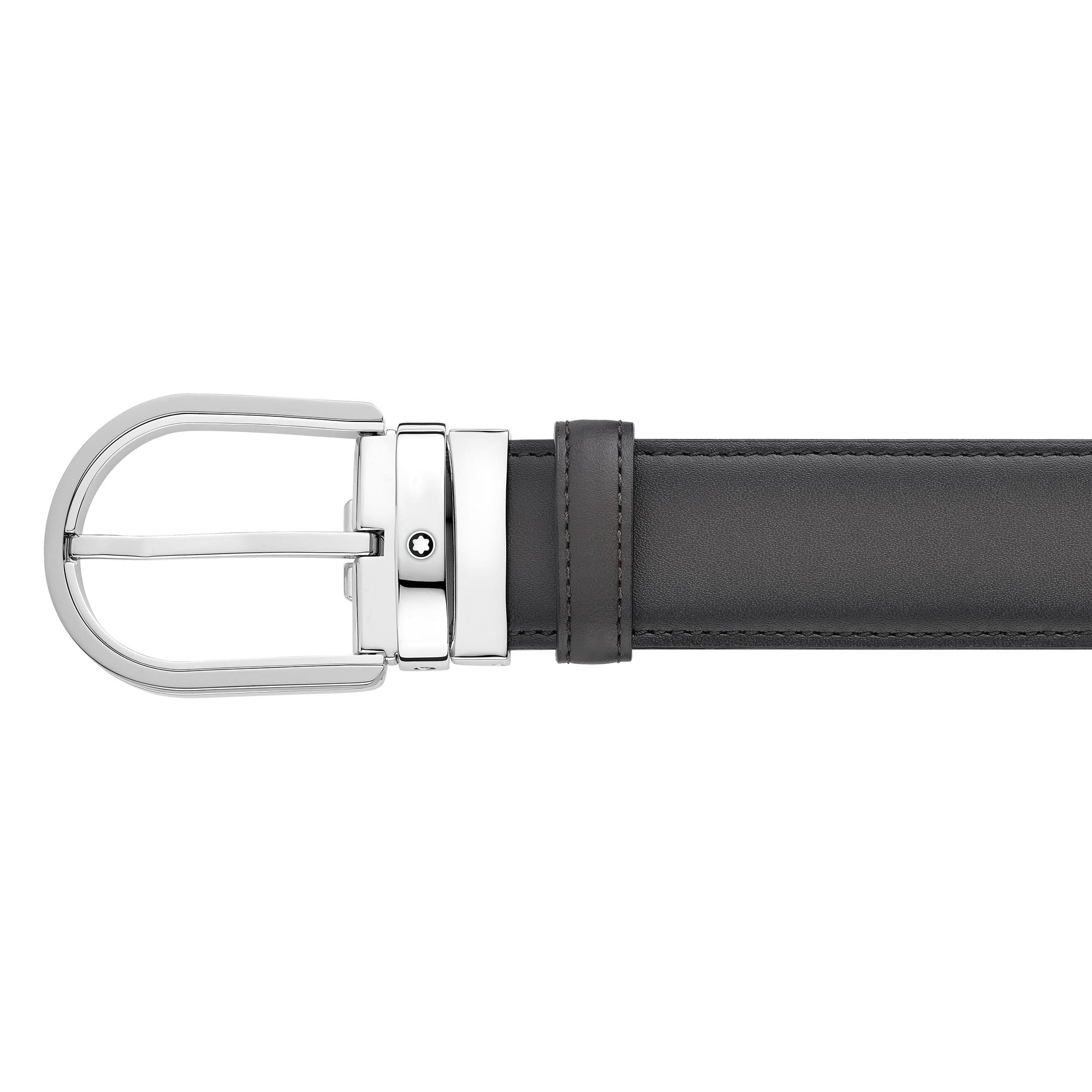 A close-up of the Montblanc Horseshoe Leather Belt showcases its elegant black leather design, adorned with a polished silver horseshoe buckle and a delicate emblem, set against a white background.