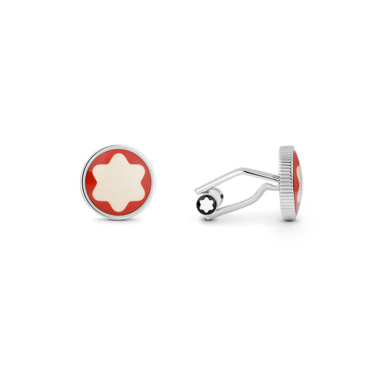 The Montblanc Heritage Rouge Et Noir cufflinks from Montblanc showcase a rounded design with a red border and a striking white star-shaped pattern at the center. Featuring a glossy metal finish, one cufflink is flat while the other is upright, revealing its attachment mechanism. Style Number 129956 effortlessly enhances any outfit with its elegance.