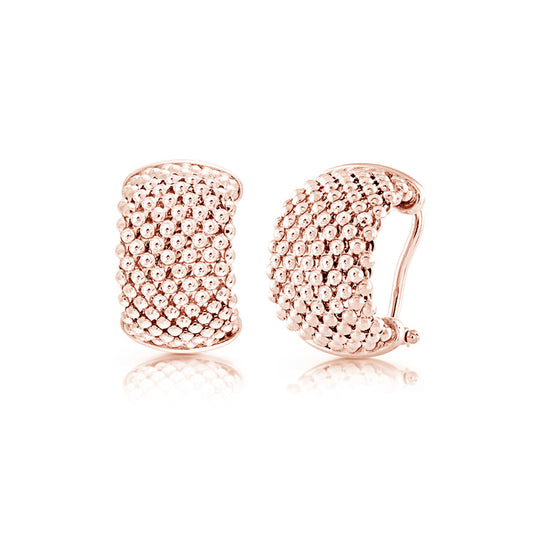 Miss Mimi by Yael presents the Iconic Beaded Mesh 18K Rose Gold Vermeil Huggie Earrings, featuring a textured, beaded design. With one earring shown front-facing and the other slightly turned to reveal its elegant curve, these earrings beautifully reflect light, highlighting their intricate details and distinctive mesh-like pattern.