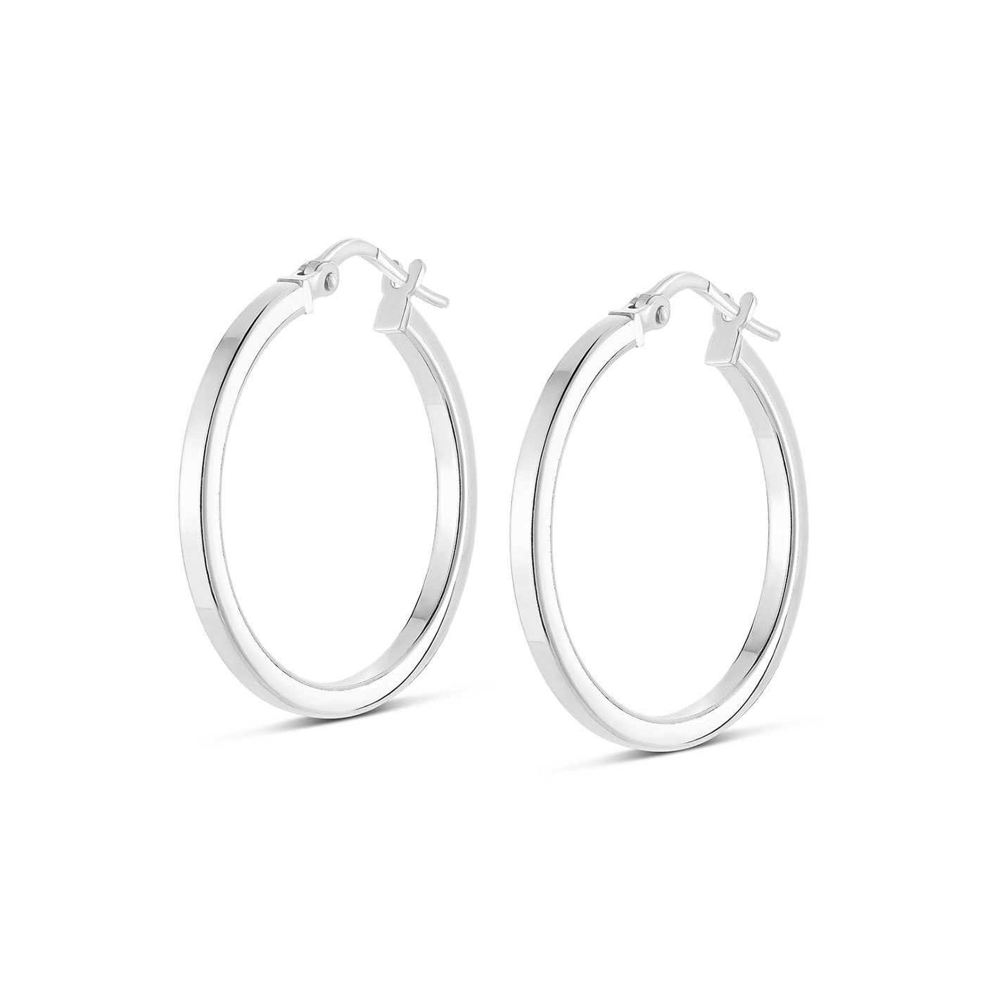 A pair of Miss Mimi Sterling Silver Medium Square Edge Hoop Earrings by Yael, featuring a 35mm diameter and a sleek polished finish with a straightforward latch closure. The rhodium bonding elevates their elegance against a white backdrop, highlighting their refined and sophisticated design.