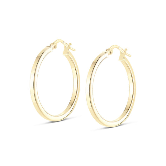 The Miss Mimi by Yael collection introduces the Miss Mimi 18K Yellow Gold Vermeil and Sterling Silver Medium Square Edge Hoop Earrings. These earrings showcase a sleek, square-edge design with a polished finish, elegantly presented against a plain white background and secured with a simple latch-back closure.