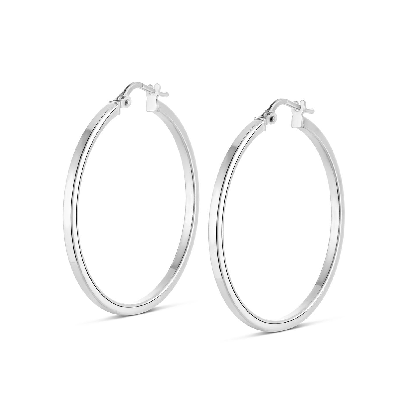 The Miss Mimi Sterling Silver Large Square Edge Hoop Earrings by Yael, featuring latch closures and a 45mm diameter, are elegantly showcased on a white background.