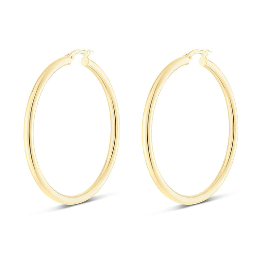 Displayed on a white background, the Miss Mimi by Yael 18K Yellow Gold Vermeil and Sterling Silver Large Round Tube Hoop Earrings feature a shiny smooth finish with a 45mm diameter.