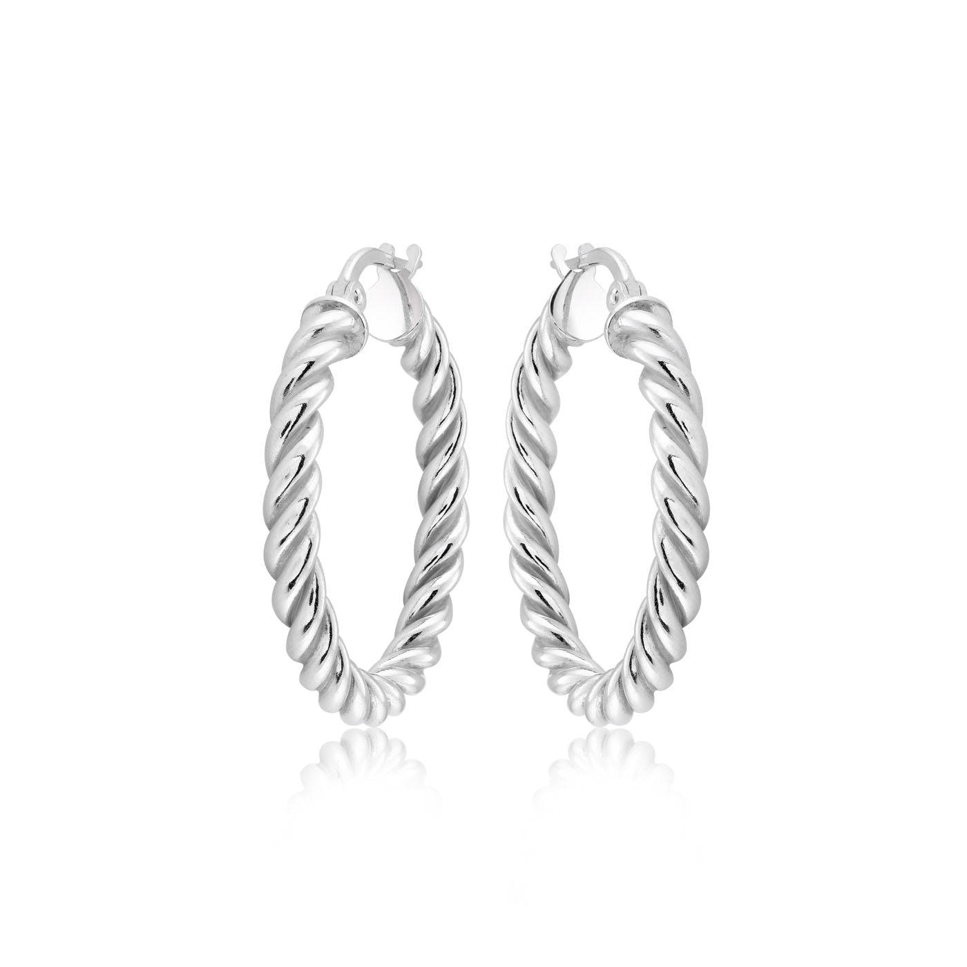 The Miss Mimi Sterling Silver Small Twist Earrings by Miss Mimi by Yael beautifully reflect light against a white background. Crafted from sterling silver, their twisted design offers a textured and shiny appearance.