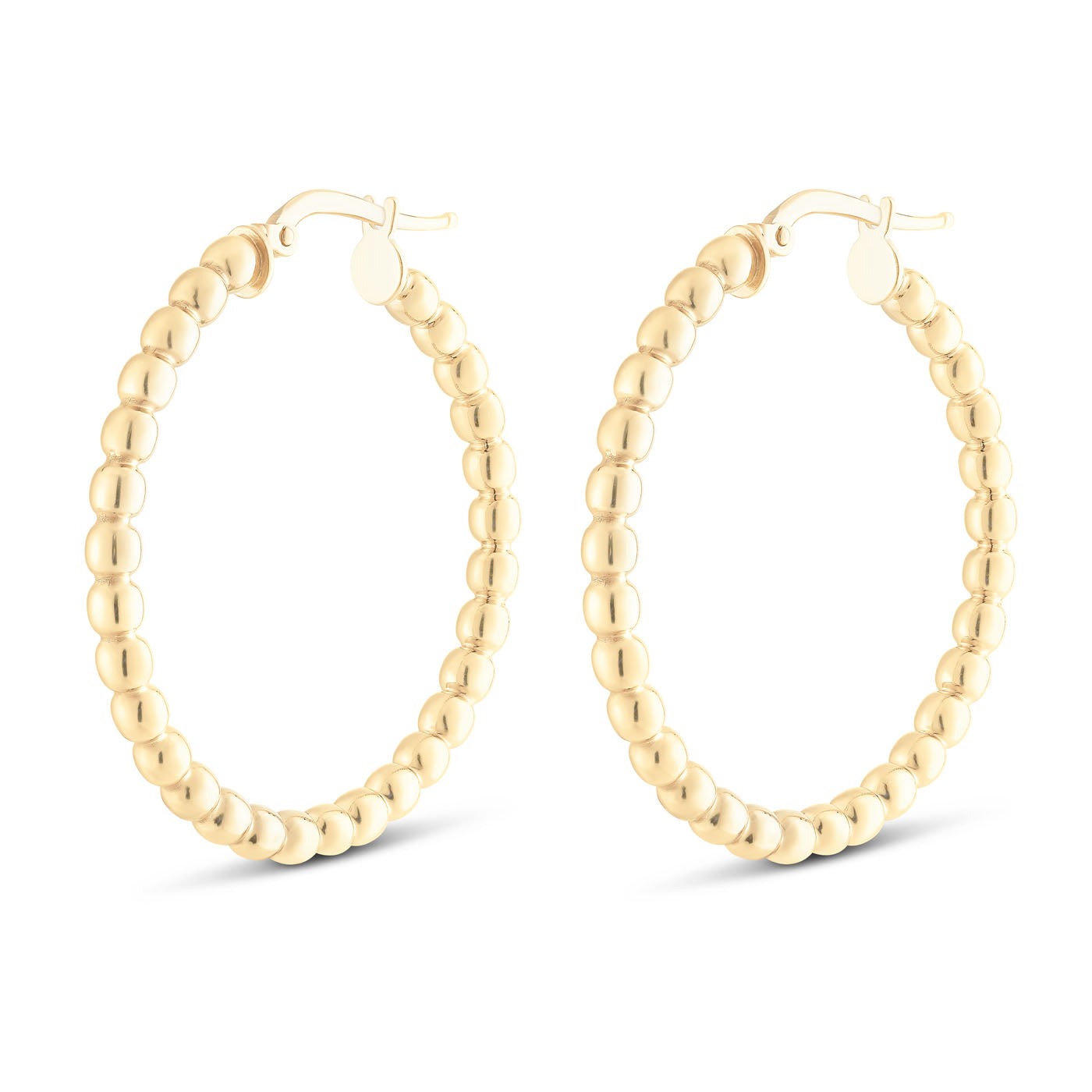 Introducing the Miss Mimi 18K Yellow Gold Vermeil and Sterling Silver Large Beaded Hoop Earrings by Miss Mimi by Yael. These elegant hoops feature a beaded design, crafted from 18kt yellow gold vermeil. The earrings showcase small, round beads arranged in a circular pattern, complete with a secure clasp at the top for fastening.