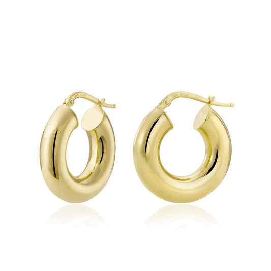 The Miss Mimi 18K Yellow Gold Vermeil Hoop Earrings by Yael feature a thick, rounded design with a glossy finish. Crafted in Italy, these exquisite earrings boast a secure latch closure and are displayed side by side against a plain white background to highlight their shiny elegance.