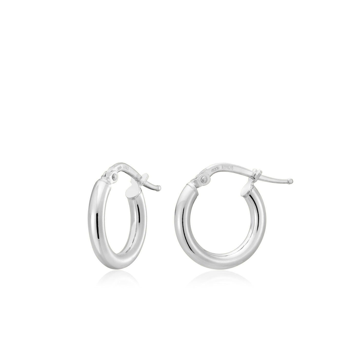 The Miss Mimi Sterling Silver Hoop Earrings by Miss Mimi from Yael, crafted from premium sterling silver in Italy, feature a smooth and polished finish set against a plain white background. These earrings have an outer diameter of 10mm and are designed with a slight opening to highlight their chic hinge and clasp mechanism.