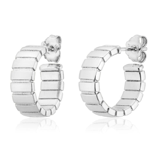 Introducing the Miss Mimi Sterling Silver Grooved Hoop Earrings by Miss Mimi by Yael—Italian-crafted with a segmented, block-like design and a smooth, polished surface, beautifully showcased on a white background.