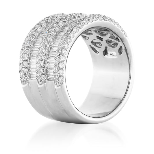 The Raffi&Co.® 18K White Gold Diamond Stacked Fashion Ring features three rows of round diamonds with a central baguette row, creating a sparkling, luxurious look by Raffi&Co. Photographed on a white background.