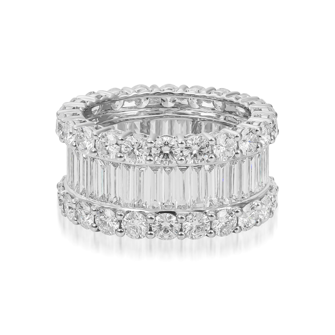 Adorn yourself with the exquisite elegance of the Raffi&Co.® 18K White Gold Fashion Ring, featuring two rows of shimmering round diamonds and a center row of dazzling baguette-cut diamonds that masterfully reflect light and highlight its intricate detailing.