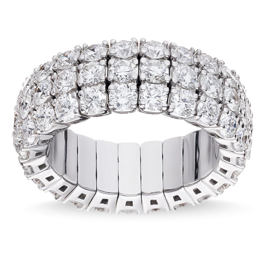 The Raffi&Co.® 18K White Gold Round Brilliant Diamond Fashion Ring showcases multiple rows of sparkling round diamonds set in a sophisticated and intricate design. The closely aligned diamonds give it a luxurious and radiant appearance.