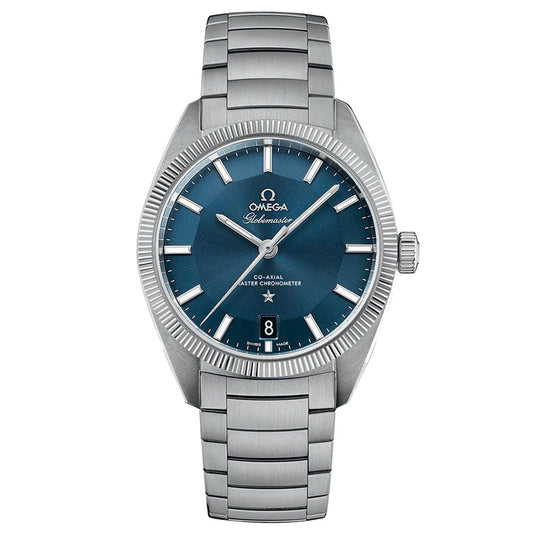 The OMEGA Constellation Globemaster Co-Axial Master Chronometer 39mm watch is a stainless steel silver wristwatch featuring a metal strap and a blue dial, enhanced by Super-LumiNova silver hour markers and hands. The OMEGA brand name is printed below the 12 o'clock position, while a date window is positioned at the 6 o'clock mark, offering Master Chronometer precision.