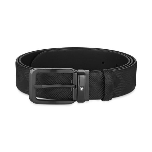 The Montblanc Extreme 3.0 Reversible Leather Belt is a stylish accessory featuring a black leather finish with a textured pattern and a sleek dark metal buckle. This 35mm belt, coiled in an elegant circular shape, showcases the sophisticated design of Montblanc.